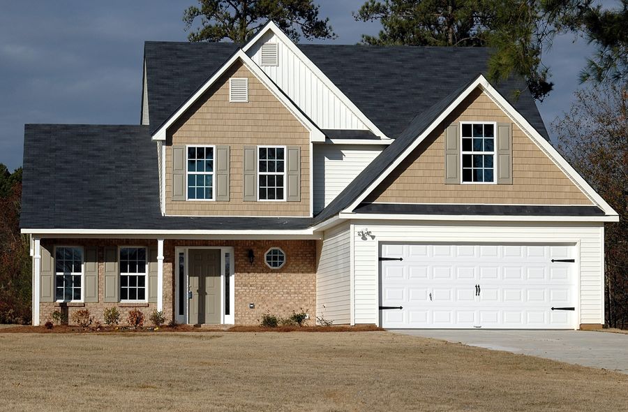 A two-storey colonial with a centre door