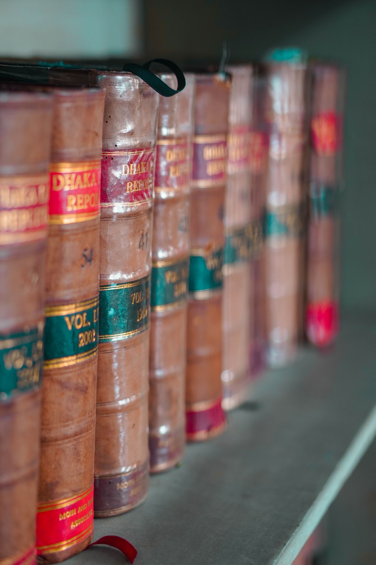 Leather-bound legal volumes ranged along a shelf